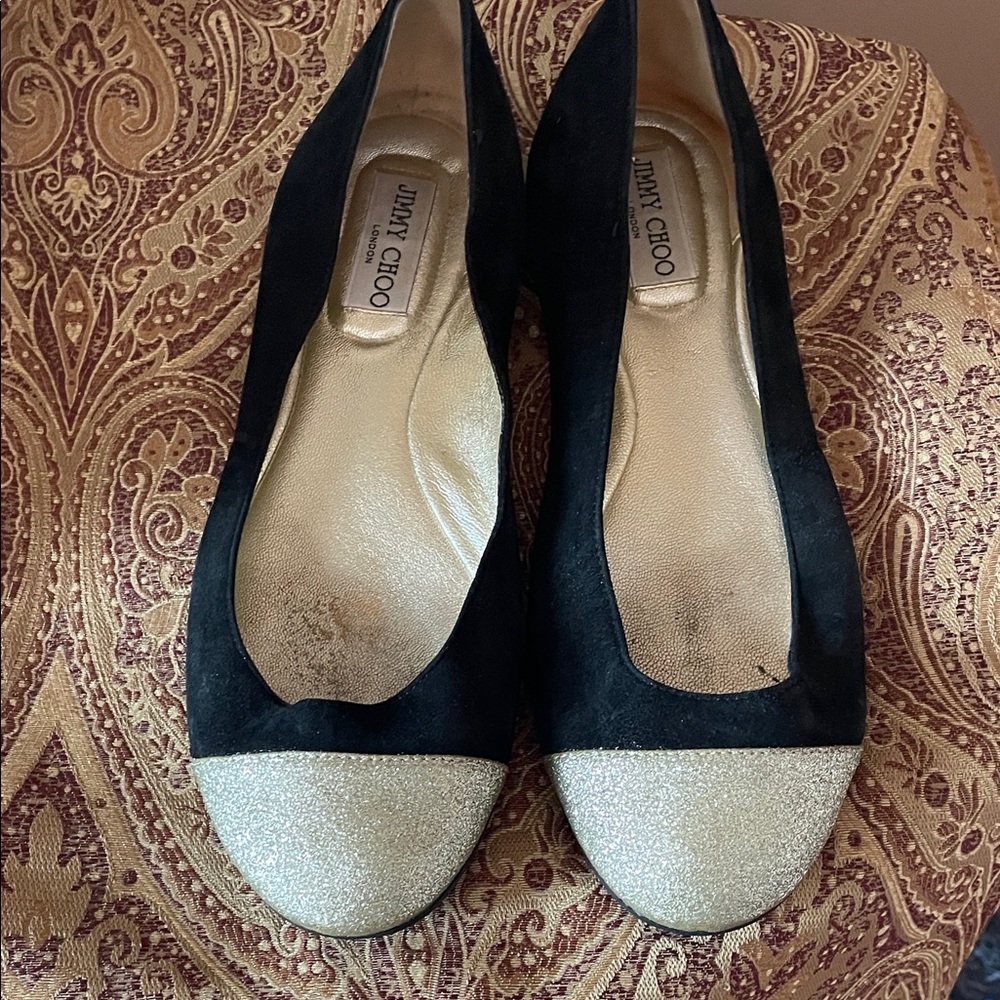 Jimmy Choo Black and Glittering Gold Flats
